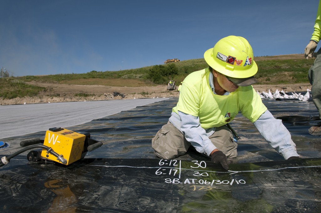 liner crew with mouse at grand river cell construction