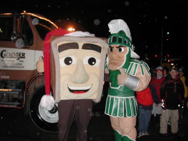 Captain Curby and Sparty at the 2004 Silver Bells Parade in downtown Lansing.